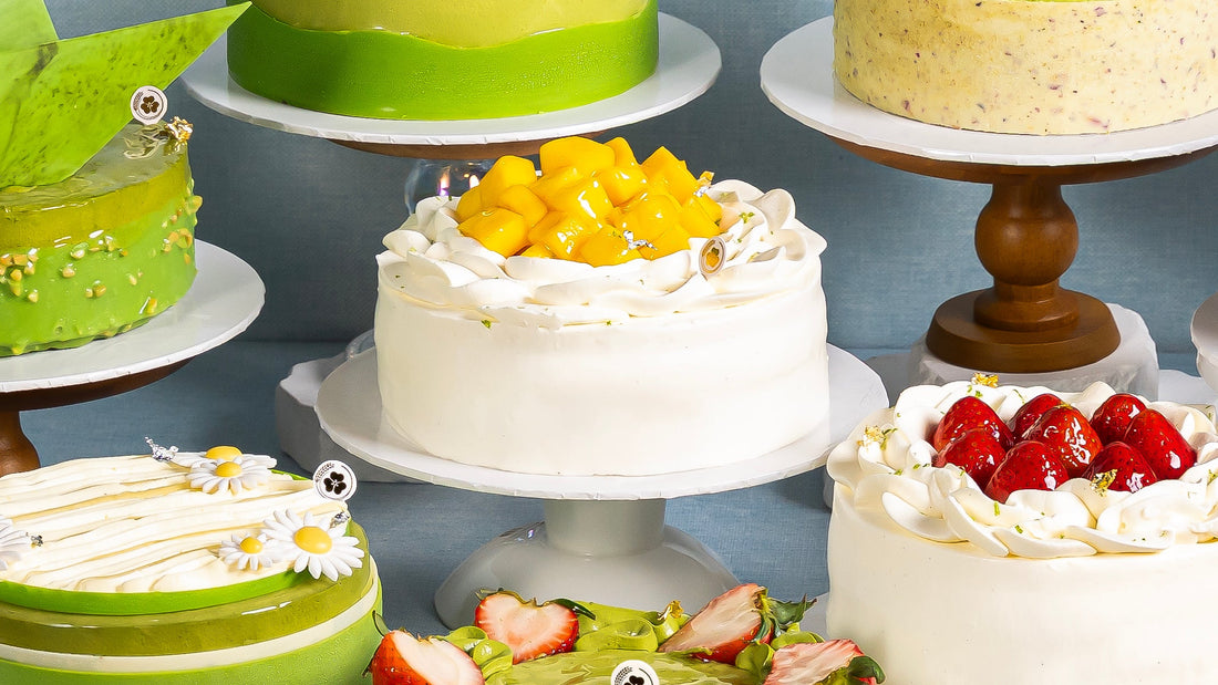 Miyabi Mango Shortcake topped with mango cubes and white cream, surrounded by other Miyabi cakes.